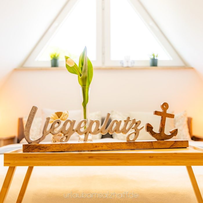 Gemütliches Schlafzimmer im Ferienhaus Pepelow mit Deko und Naturlicht